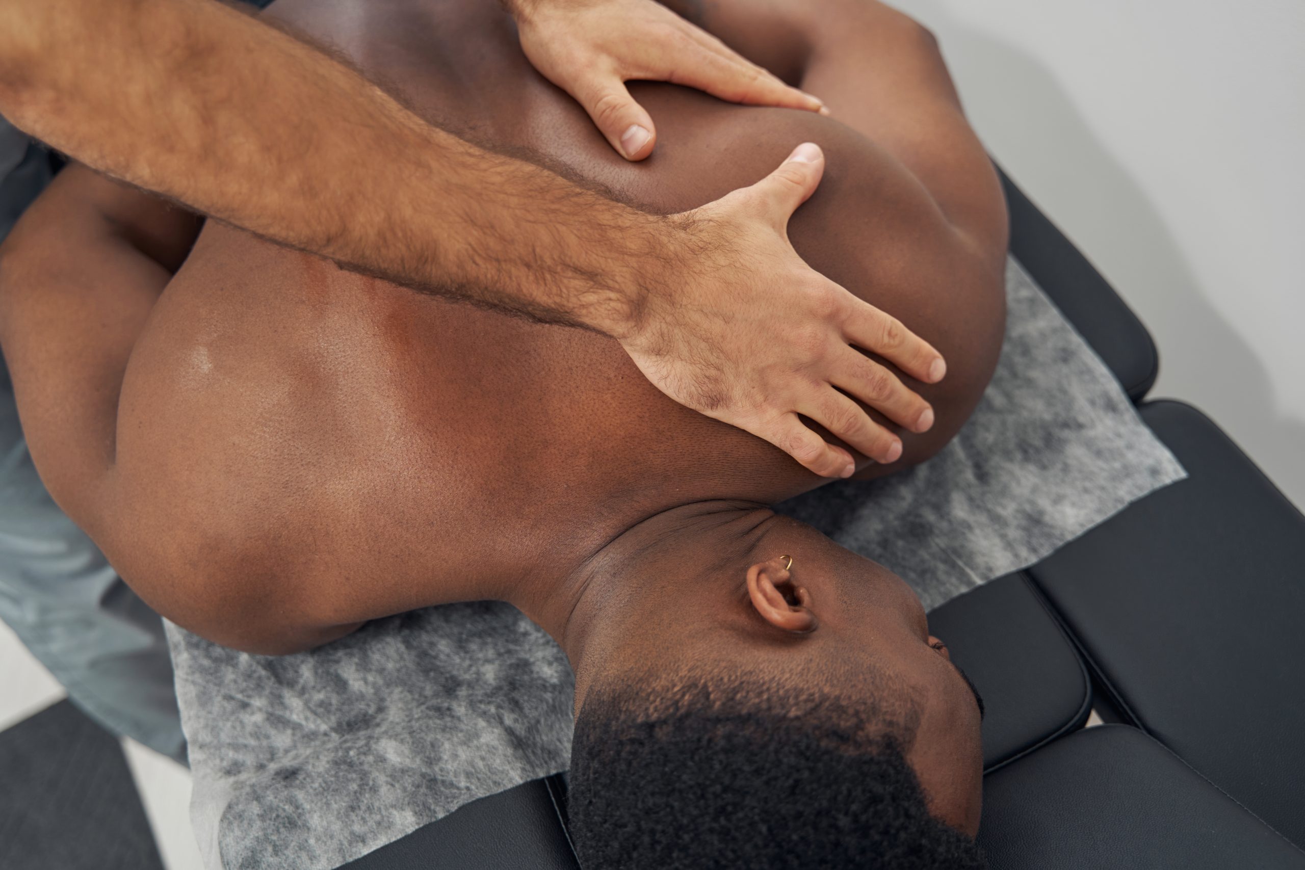 https://anchortohealth.com/wp-content/uploads/2022/03/male-patient-having-his-upper-back-massaged-2022-01-04-22-04-53-utc-scaled.jpg